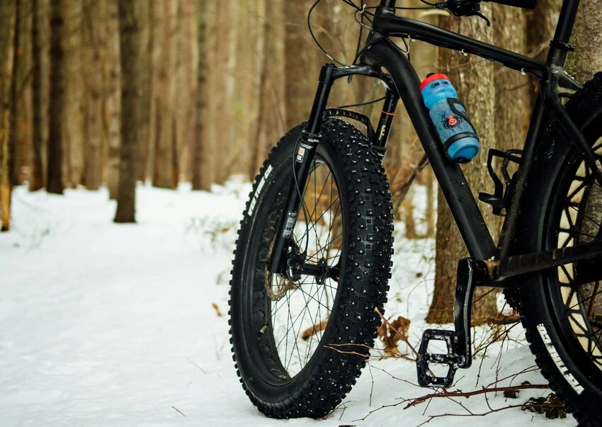 bicycle with studded bike tires in the snow